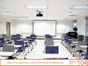 View of projection screen from back of classroom