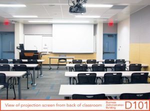 View of projection screen from back of classroom