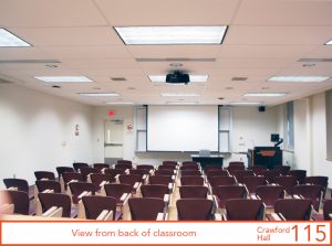 View from back of classroom, projector screen down