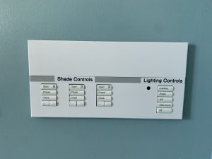 GAR 112 Window Shade & Lighting Controls (located on wall, behind lectern)